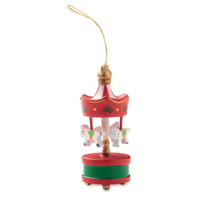 A festive carousel ornament in red and green, featuring miniature horses and a gold hanging string.