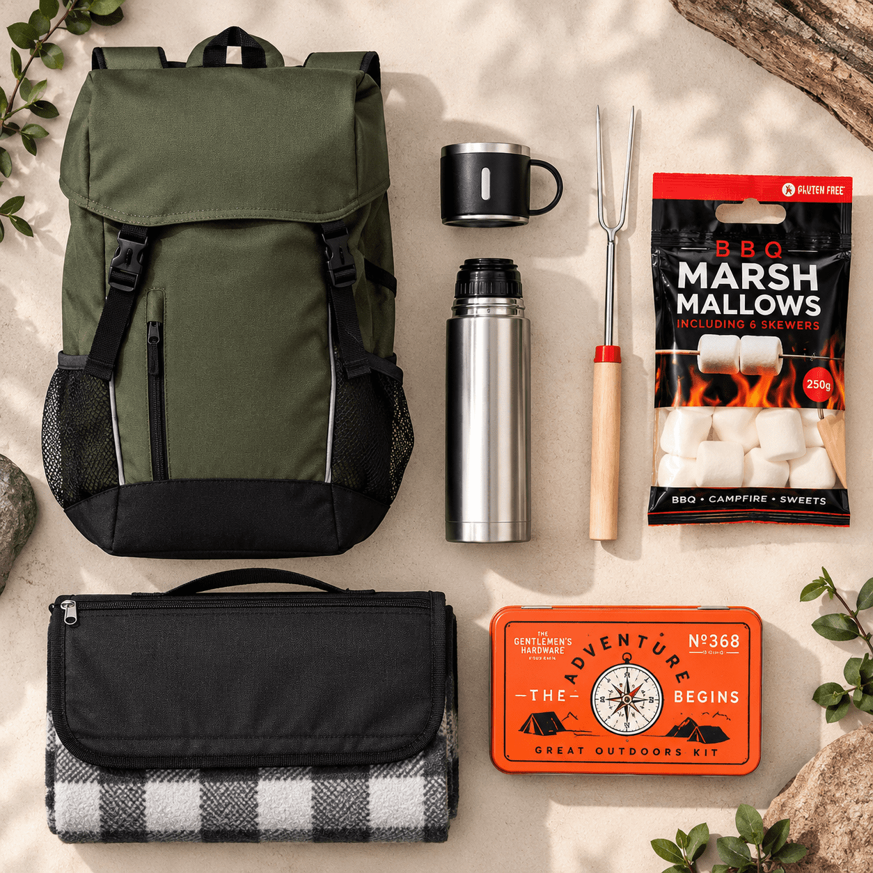 A green backpack, silver drink bottle, cup, grilling fork, pack of BBQ marshmallows, and a black and white checkered blanket.