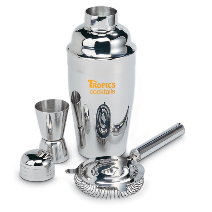 A cocktail shaker set in polished silver, including a shaker, jigger, strainer, and stirring stick, featuring a logo.