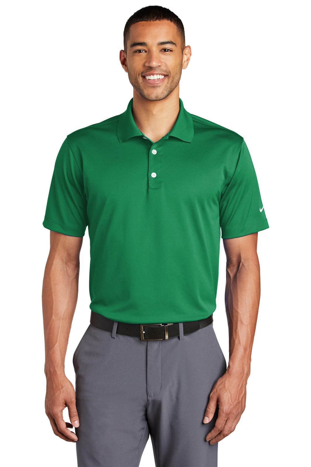 A green Nike Tech Basic Dri-FIT polo shirt with a collar and short sleeves, featuring a logo.