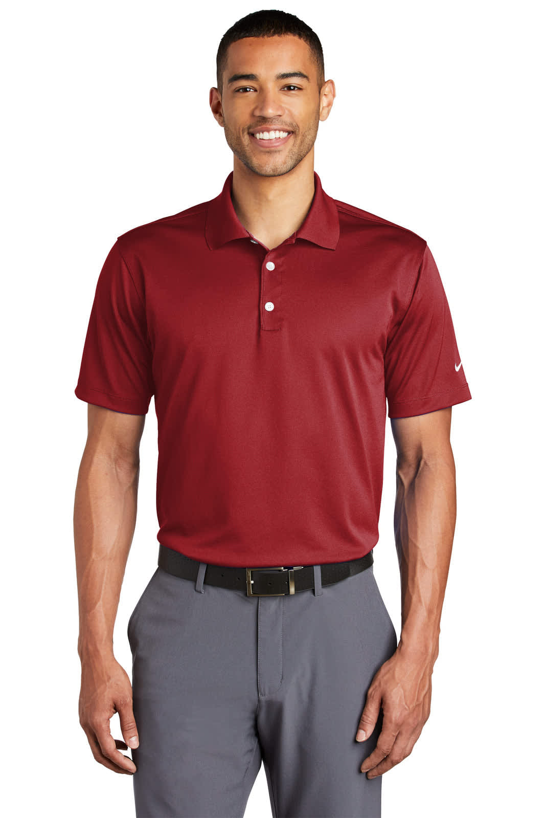 A burgundy Nike Tech Basic Dri-FIT polo shirt, featuring a collar and a logo on the sleeve.
