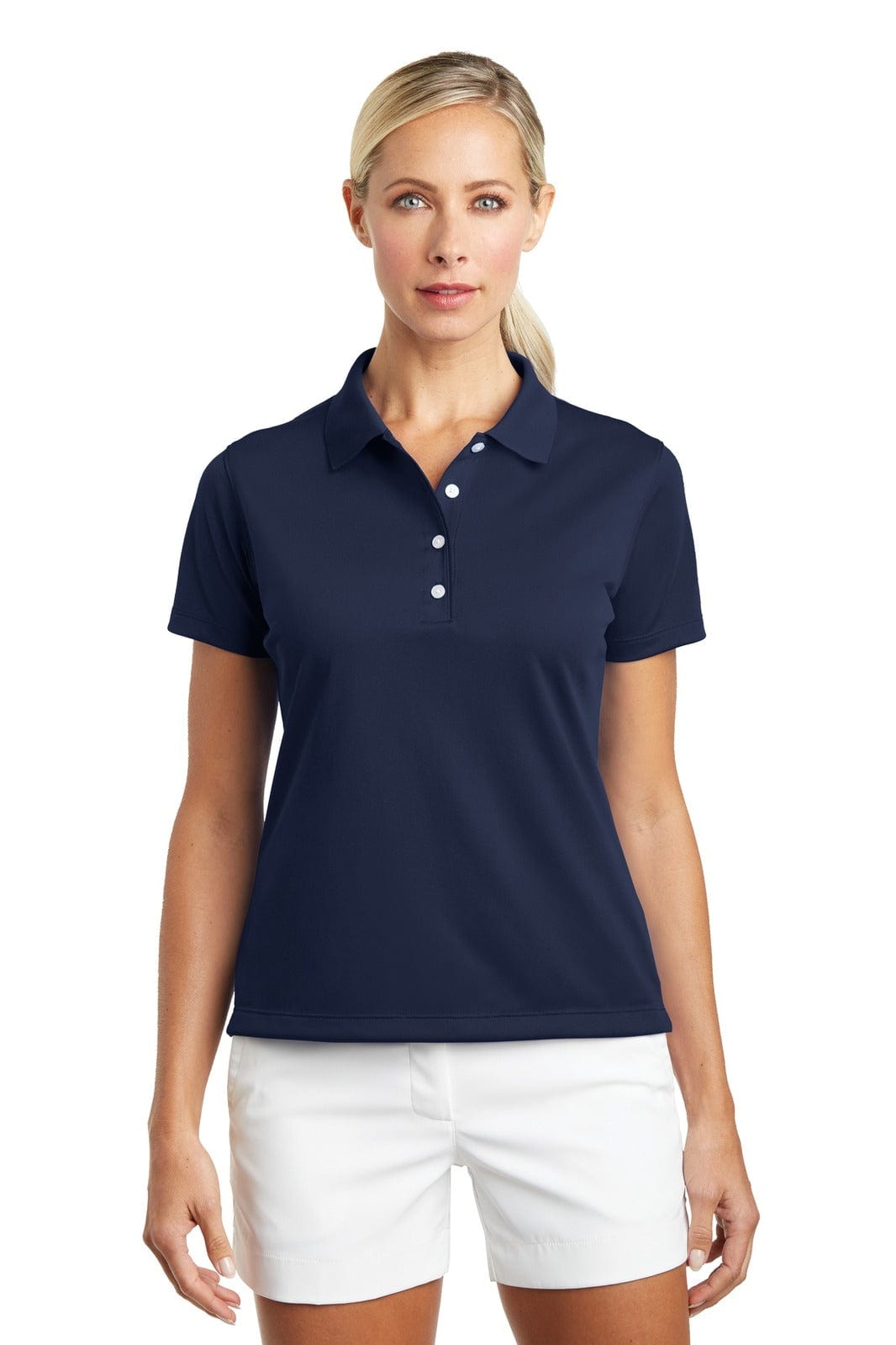 A navy blue polo shirt with a collared neckline and short sleeves, featuring a logo. Paired with white shorts.