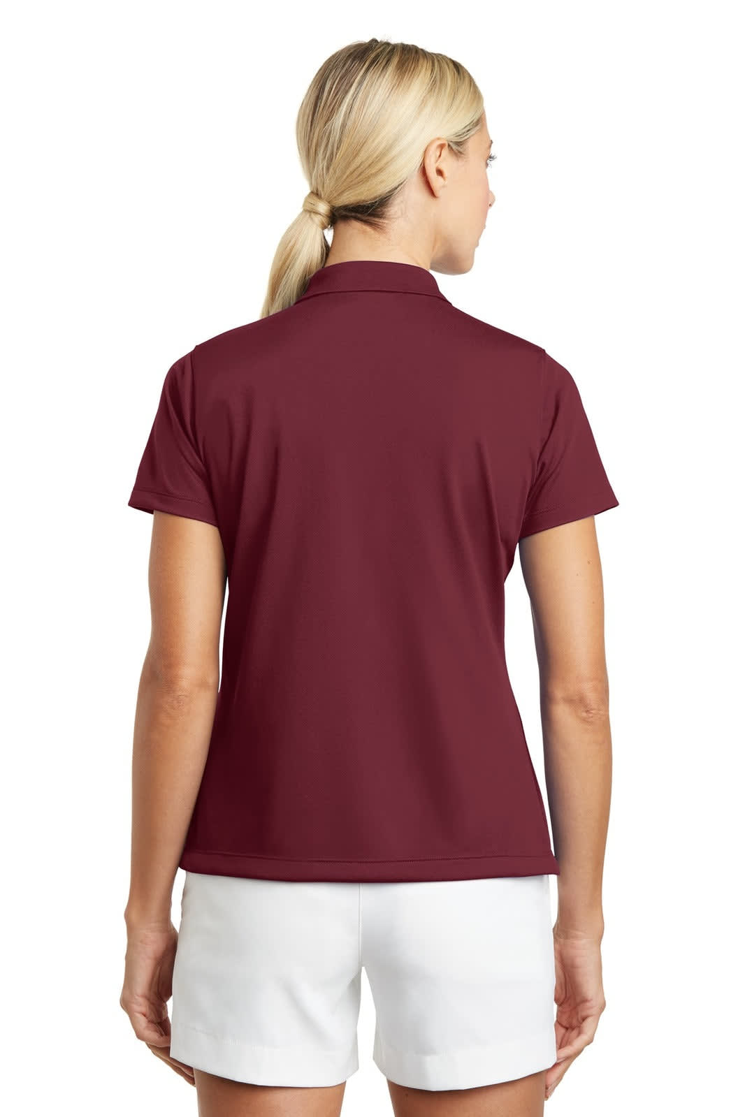 A women's polo shirt in burgundy, featuring a short sleeve design and a collar, with a logo on the back.
