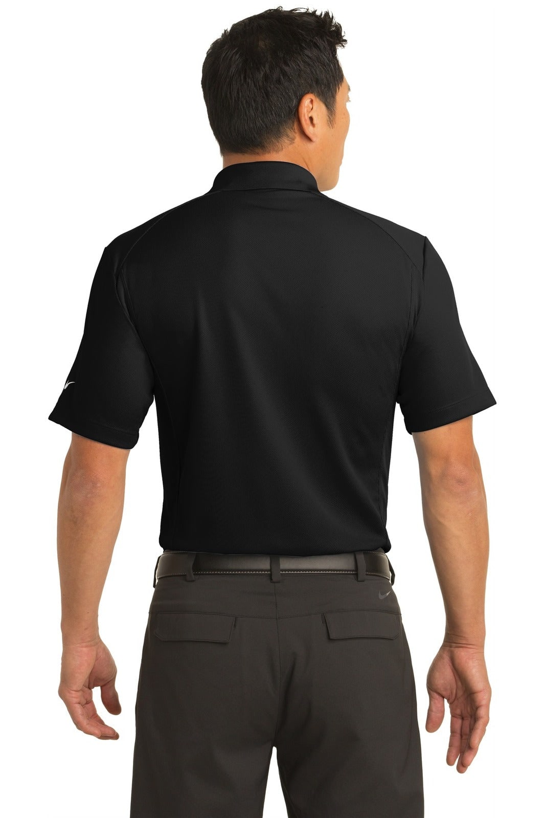 A black Nike Dri-FIT classic polo shirt displayed on a person seen from the back, featuring short sleeves.
