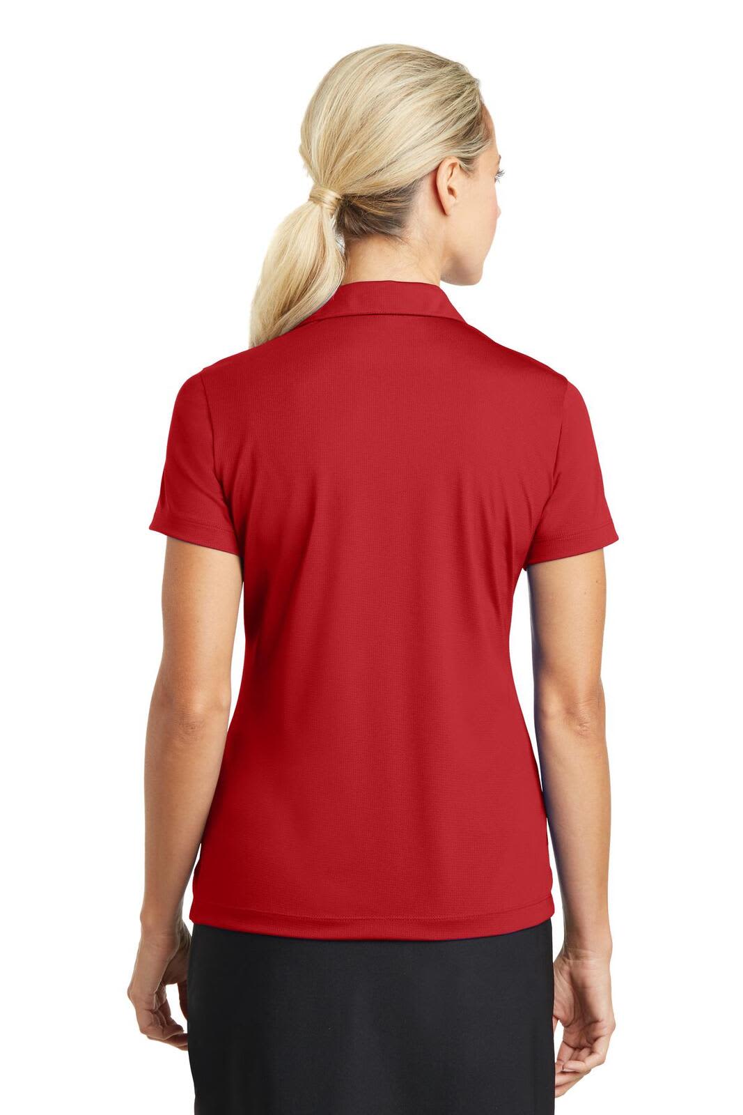 A red ladies' polo shirt featuring a mesh design and a logo on the back.