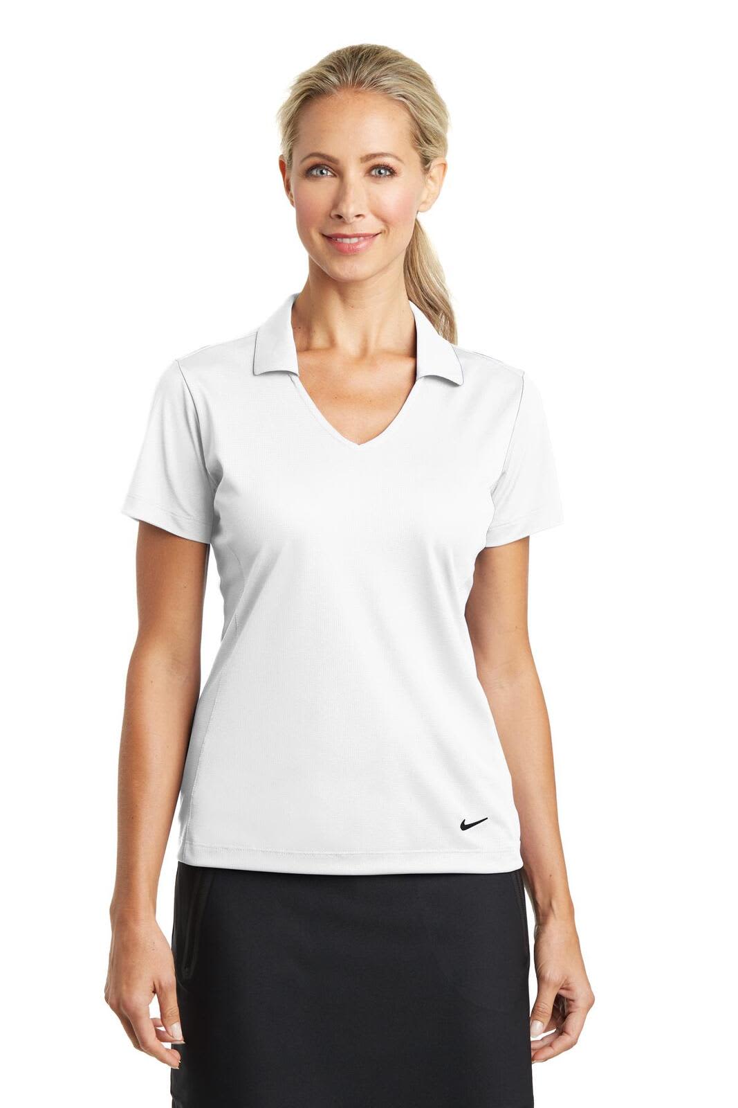 A light grey Nike ladies polo shirt with a v-neck and short sleeves, featuring a logo on the hem.
