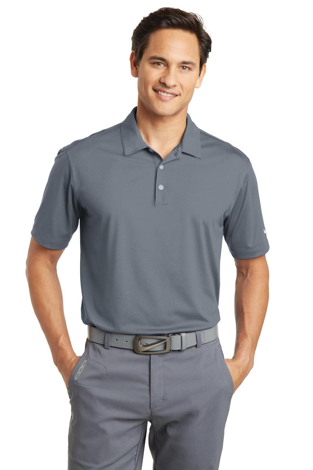 A grey Nike Dri-FIT Vertical Mesh Polo shirt with a collar and a logo, worn by a man.