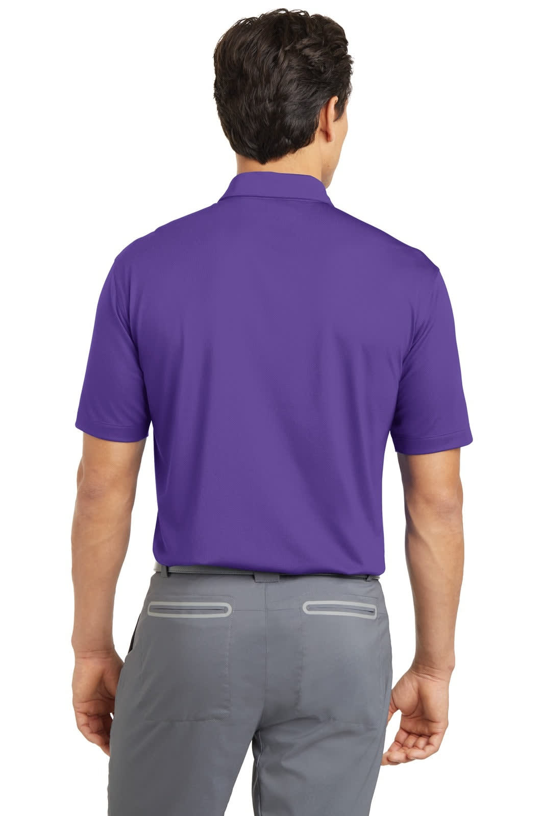 A purple polo shirt with short sleeves, featuring a logo, viewed from the back, paired with light grey trousers.