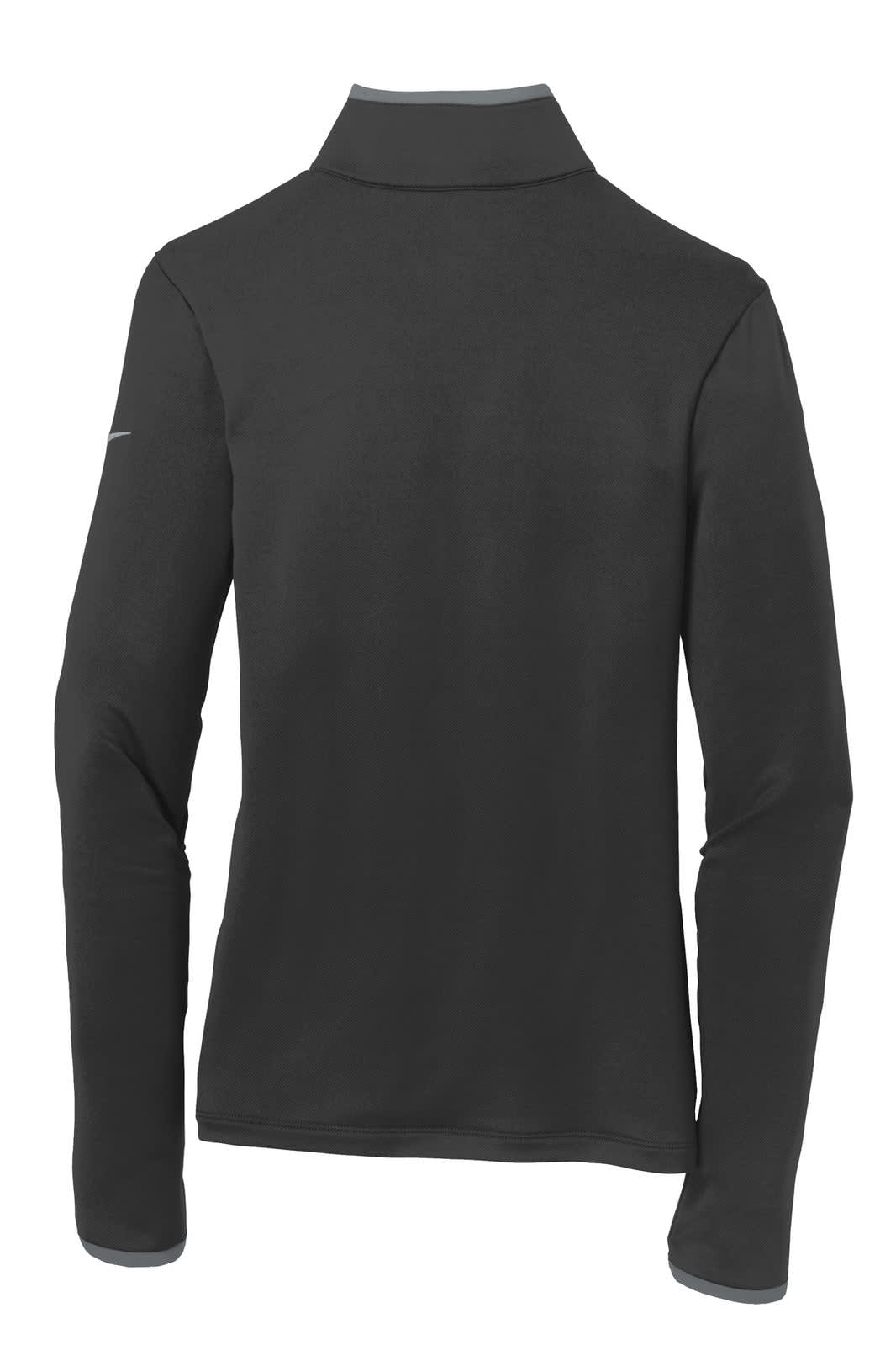 A black Nike Ladies Dri-FIT Stretch 1/2-Zip Cover-Up with a stand-up collar and long sleeves, featuring a logo.