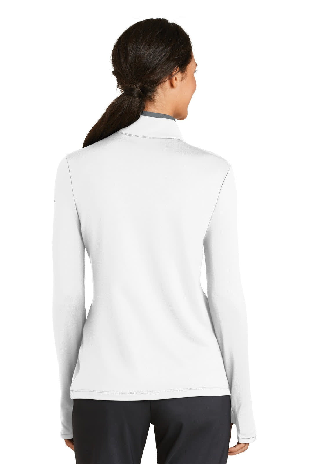 A white Nike ladies Dri-FIT stretch 1/2-zip cover-up featuring a fitted design and long sleeves.