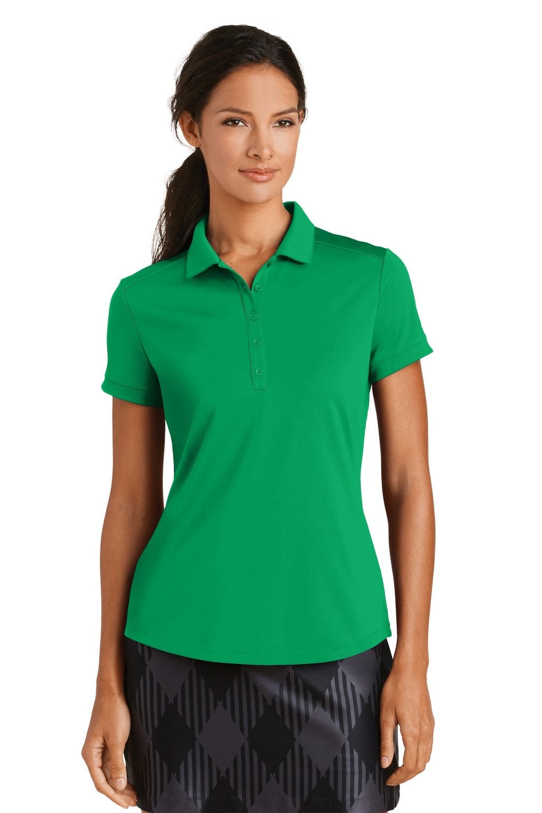 A green Nike ladies Dri-FIT polo shirt with a modern fit, featuring short sleeves and a collar.