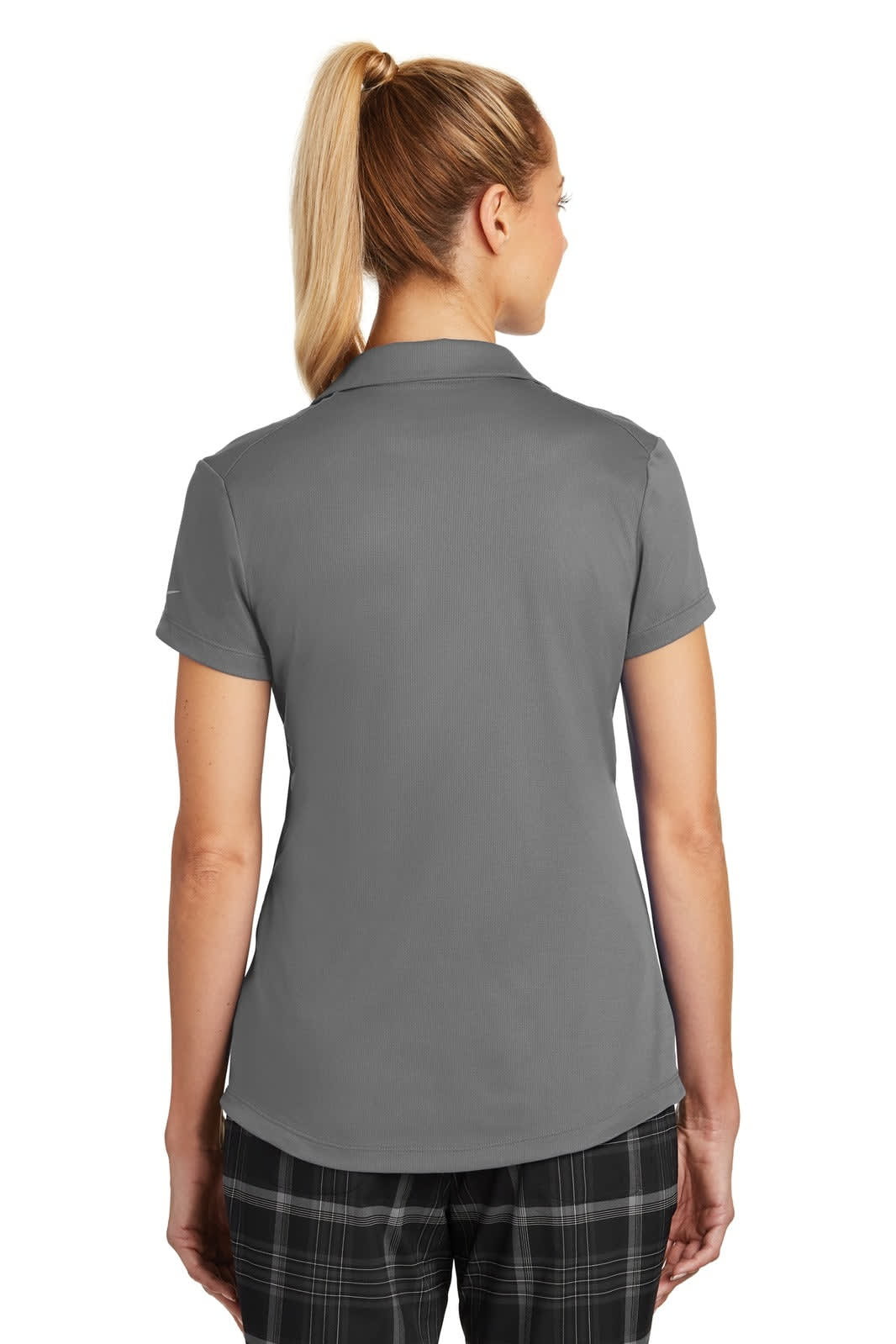 A grey Nike Ladies Dri-FIT Legacy Polo shirt displayed from the back, featuring a slim fit and short sleeves.