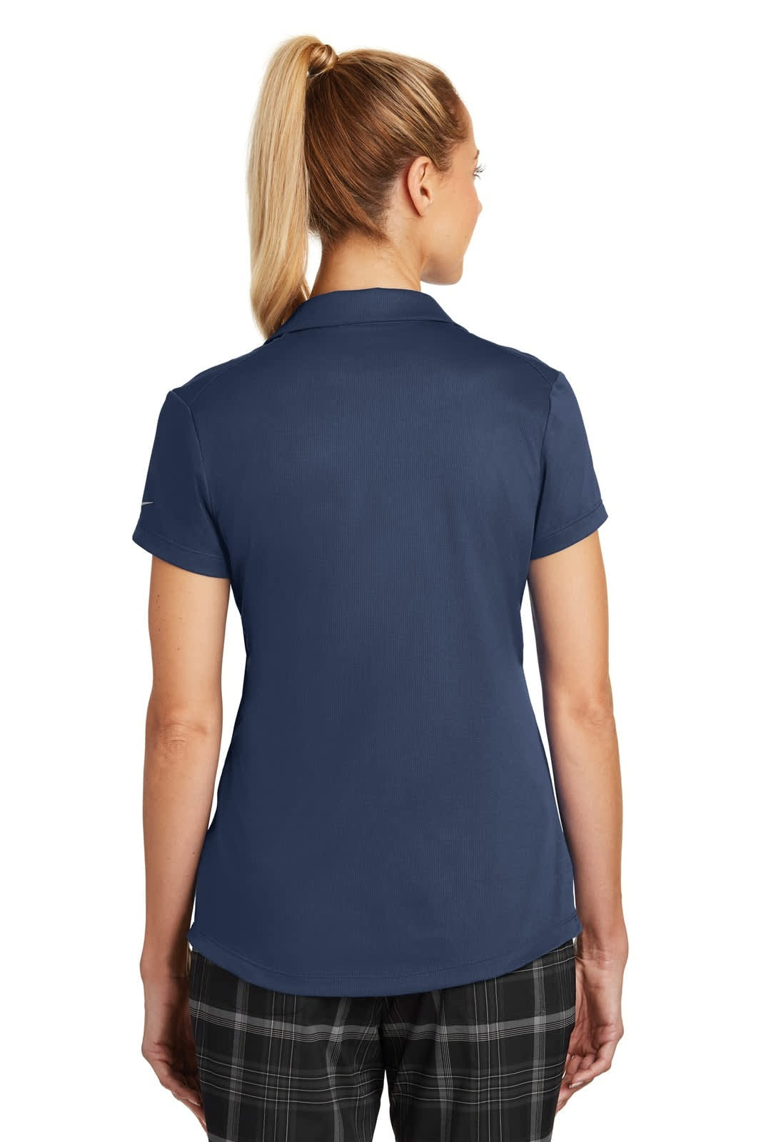 A navy blue polo shirt with short sleeves and a fitted design, featuring a logo.
