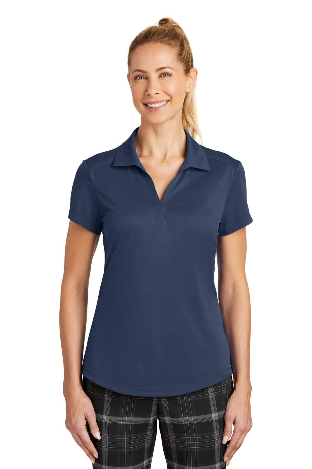 A navy blue polo shirt for ladies with a collar and a logo, displayed on a model.