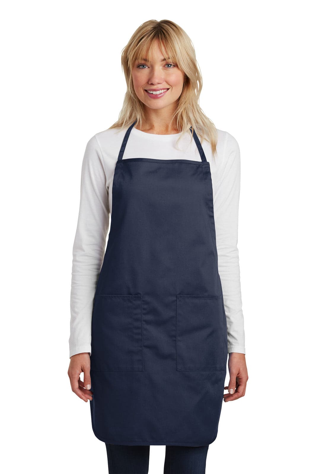 A navy blue full-length apron worn by a model, featuring a logo and ample front pocket.