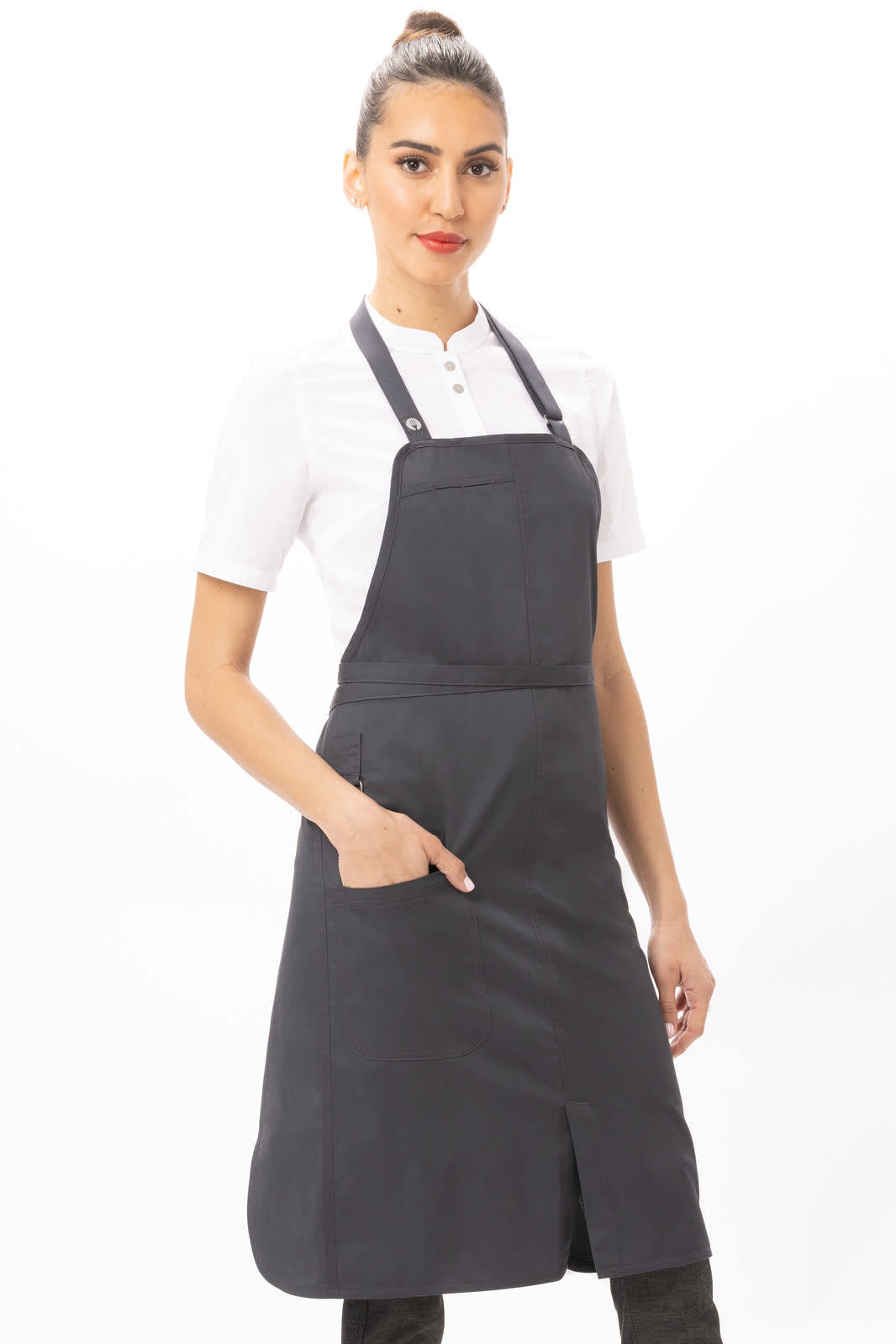 A grey bib apron worn by a model, featuring a pocket and adjustable straps, against a clean background.