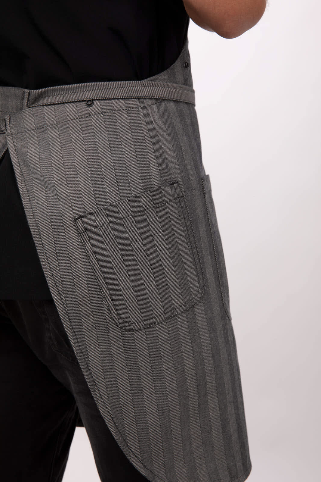 A grey striped apron with a pocket, designed for workwear, featuring a simple and practical style.