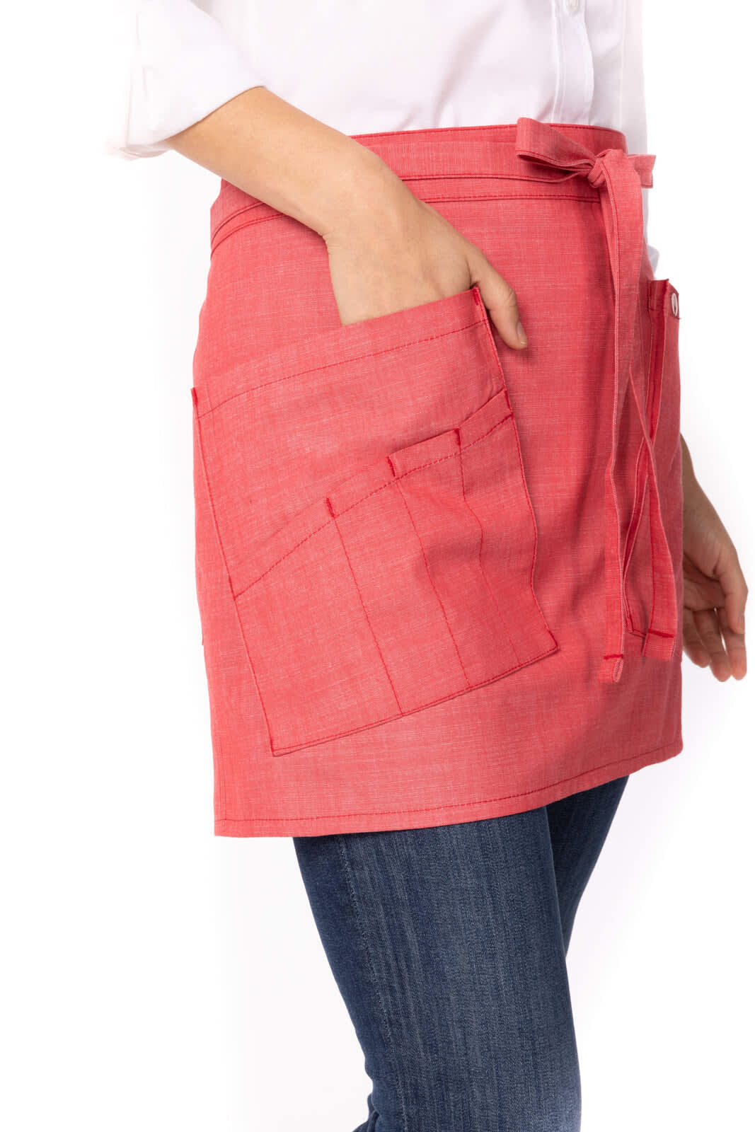 A red bistro apron featuring pockets and a tie waist, designed for workwear use.