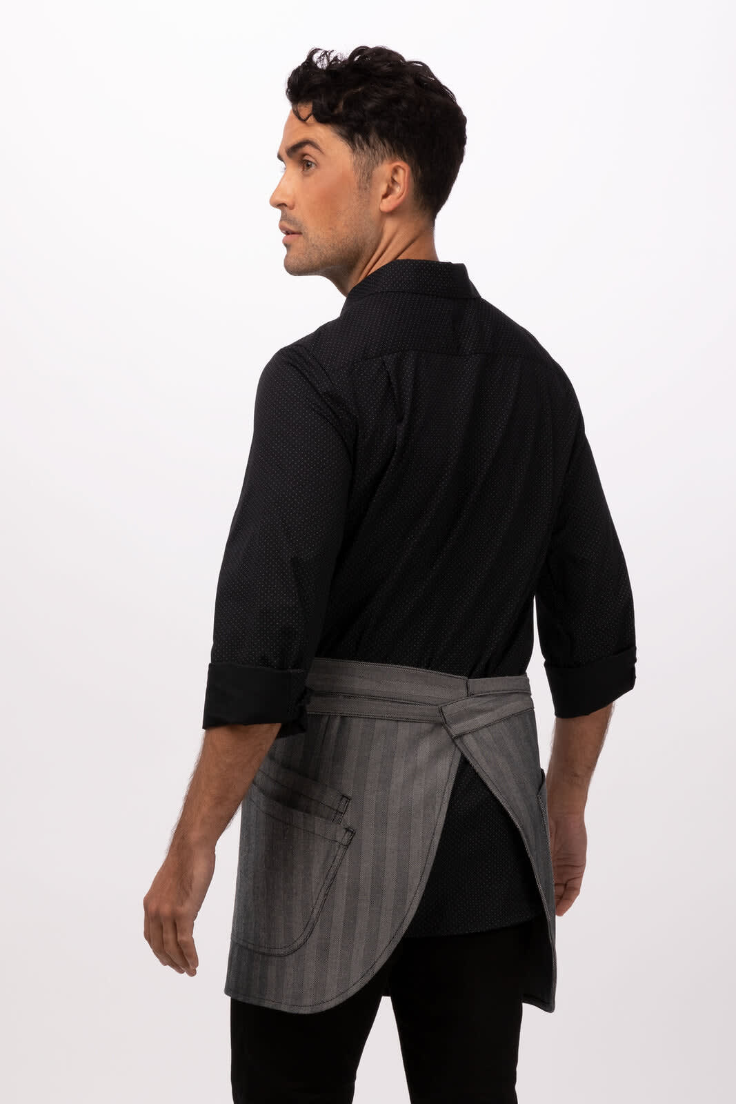 A man in a black shirt wears a grey striped half bistro apron, featuring an attached logo.