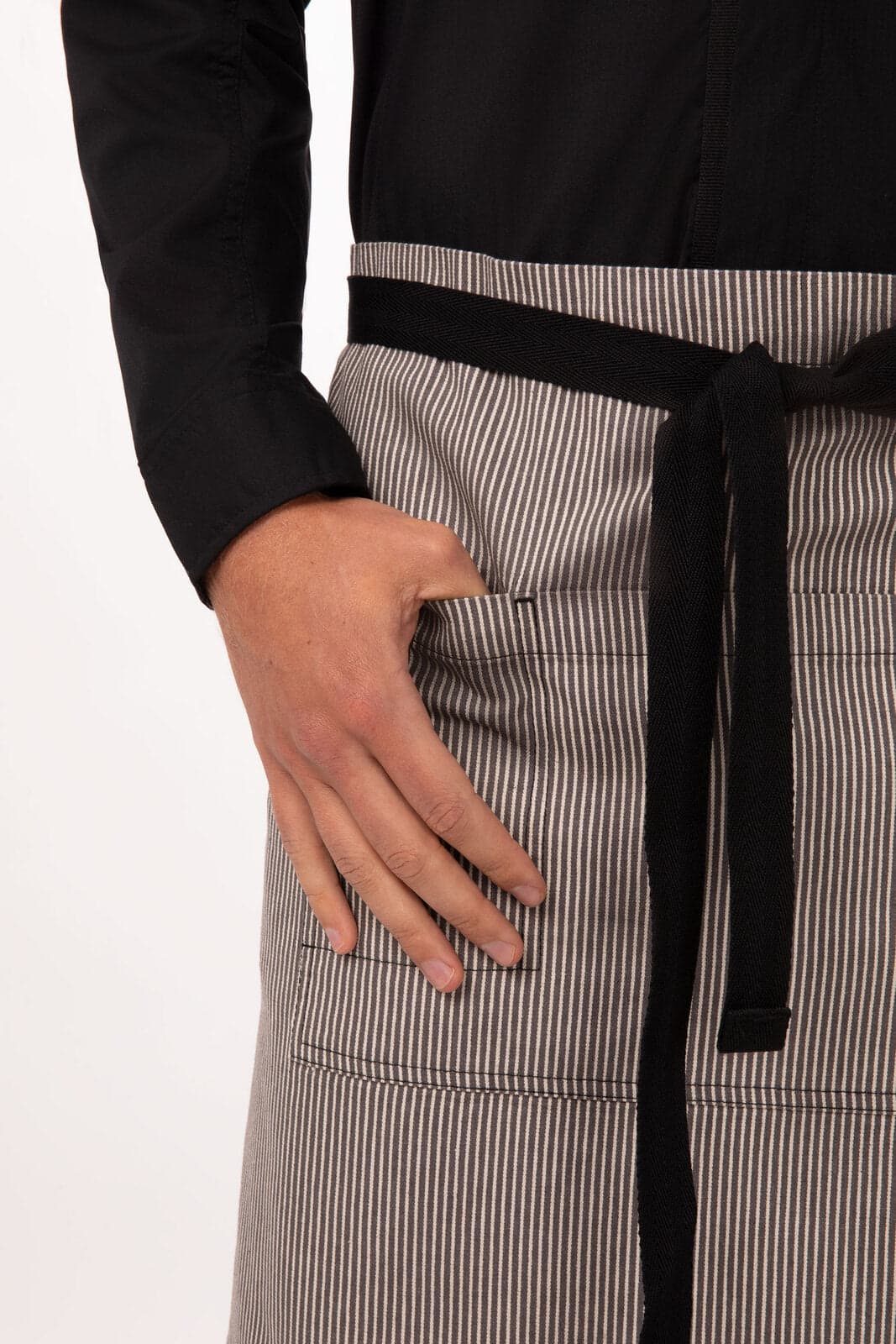 A bistro apron in black and white stripes with a front pocket and a black tie. It features a branding logo.