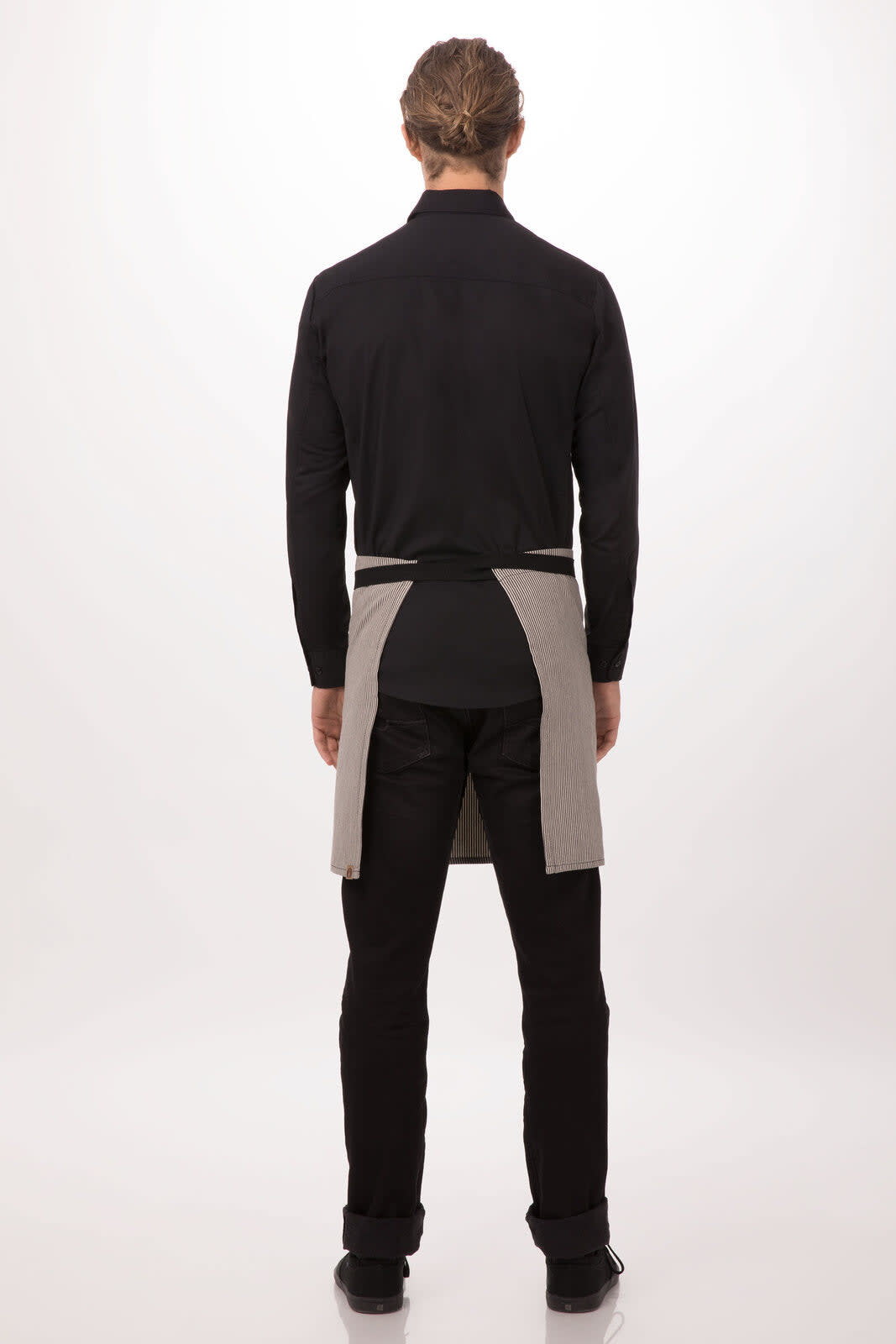 A black and grey bistro apron worn by a person, viewed from the back with a plain background.