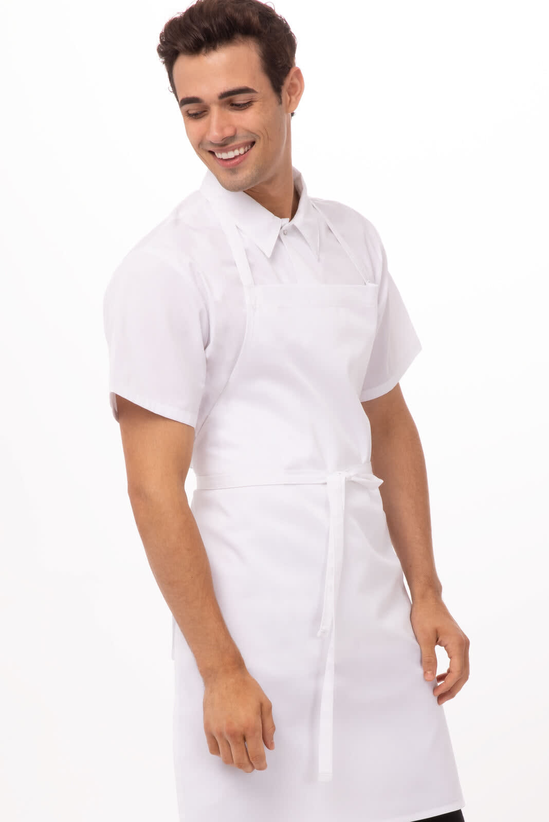 A white bib apron worn by a smiling man in a short-sleeve shirt, featuring a tie at the waist.
