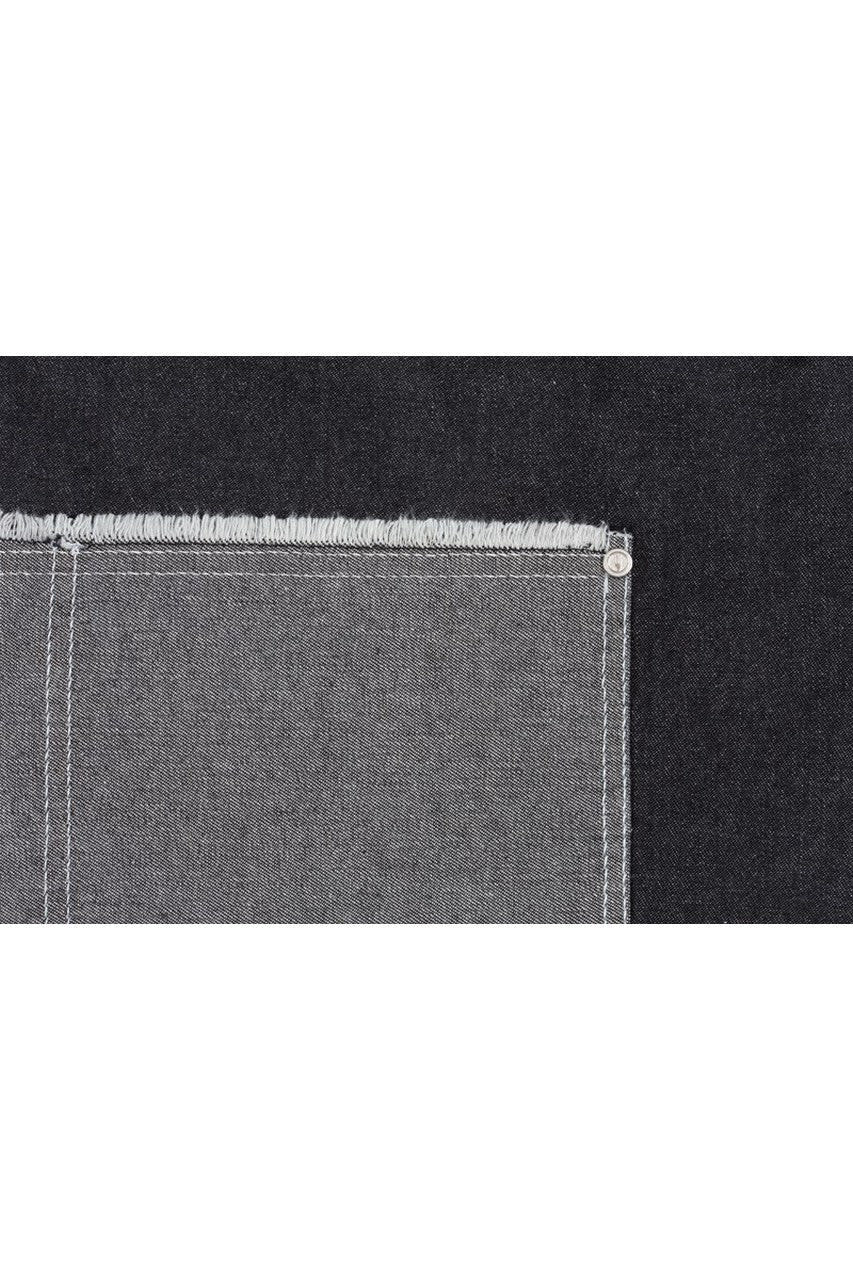 A grey and dark denim fabric featuring a raw edge hem and a metal snap. The design includes a distressed texture.