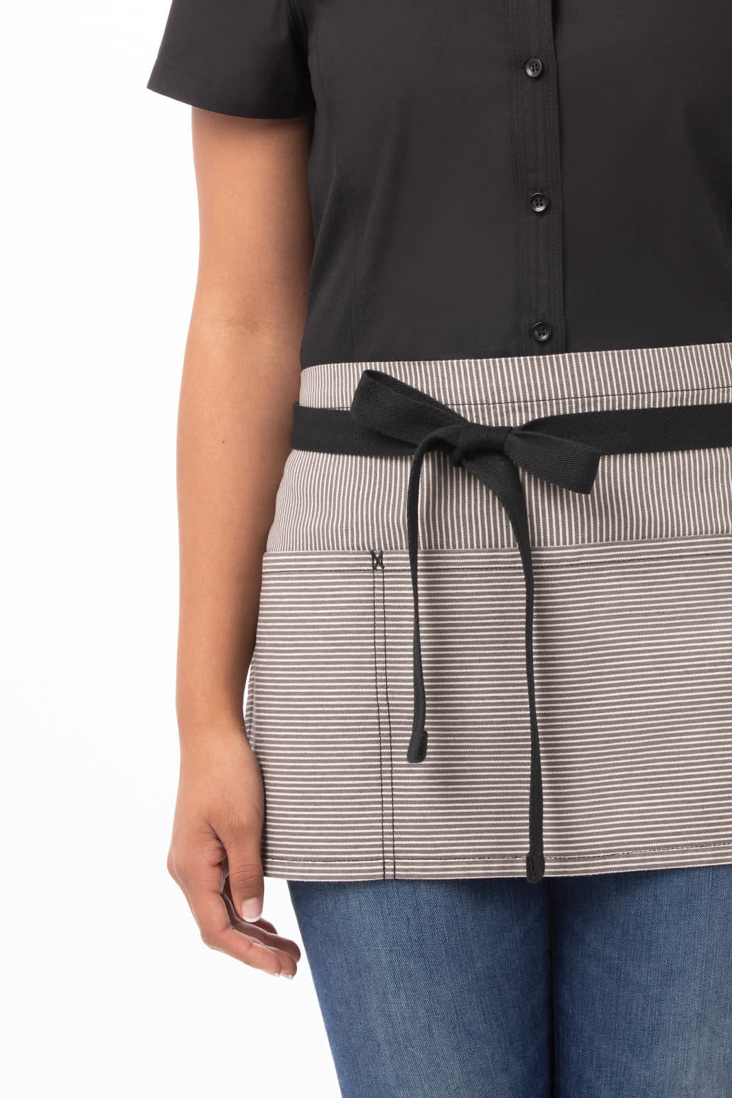 A waist apron featuring a black top section and a striped bottom section, complete with a tied belt.
