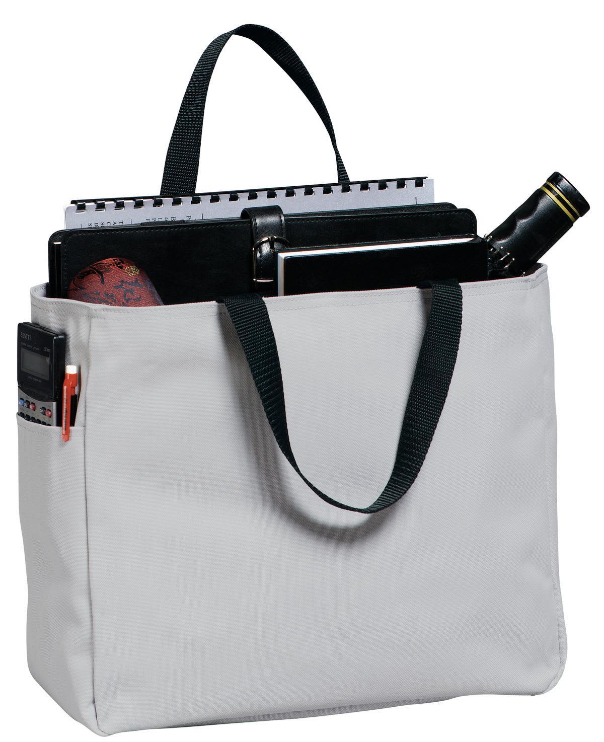 A grey tote bag with a black strap, containing a notebook, tablet, and a drink bottle. It has a small logo.