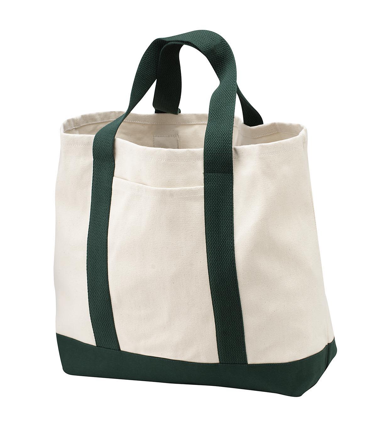 A two-tone shopping tote in cream with green handles and bottom, featuring an external pocket and a logo.