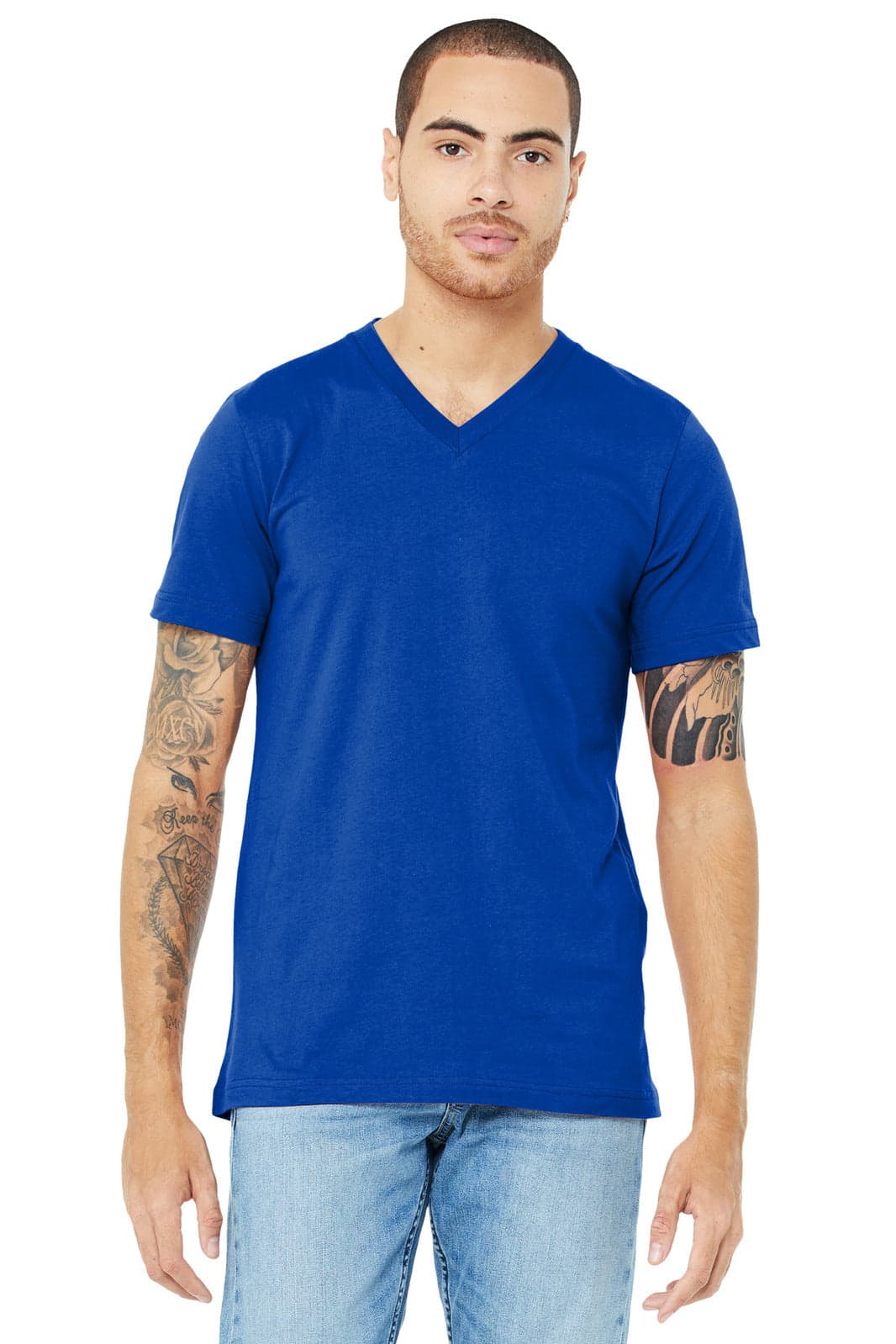 A blue unisex jersey short sleeve v-neck tee displayed on a model, featuring a logo on the sleeve.