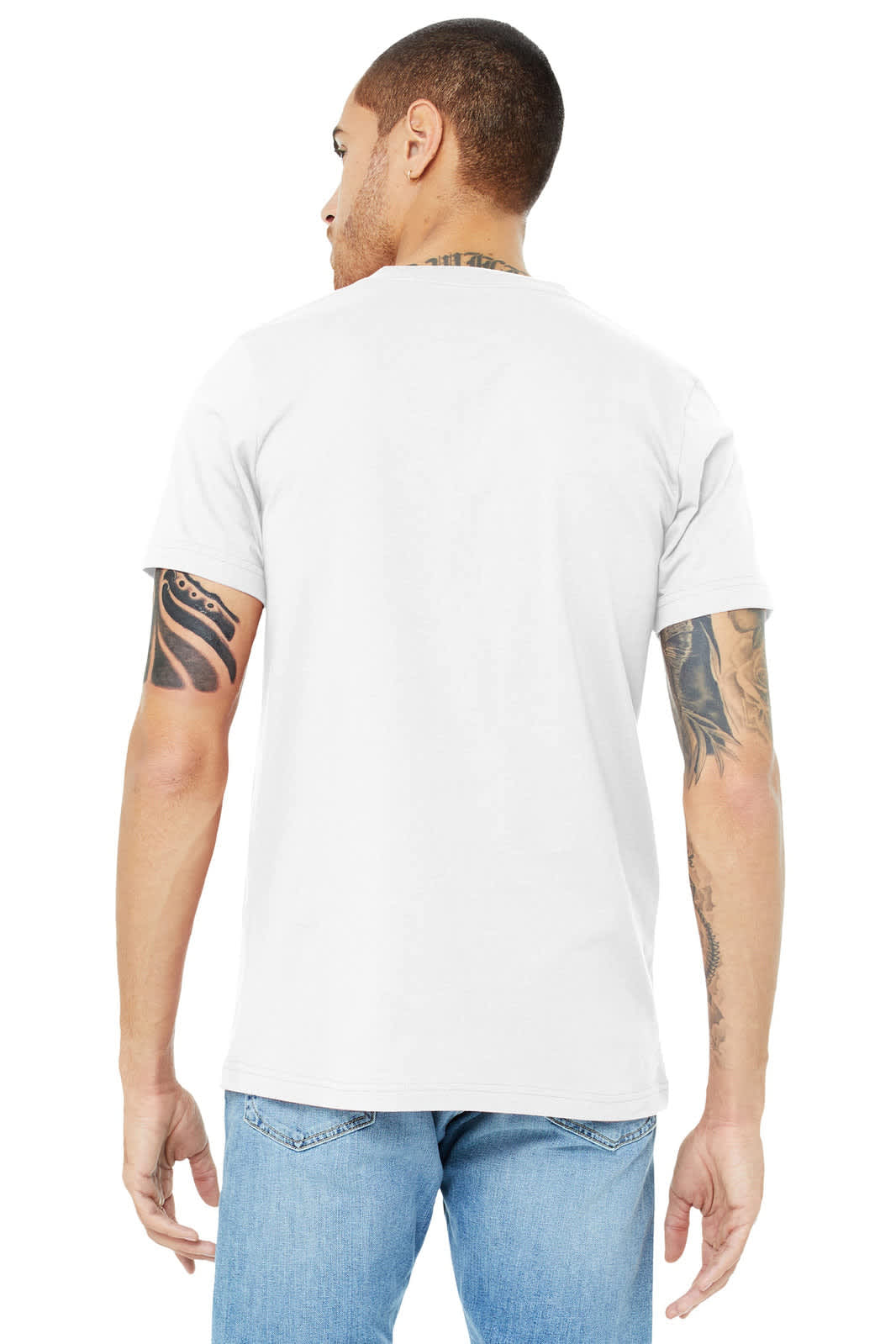 A man is wearing a grey unisex jersey short sleeve V-neck tee, viewed from the back. The shirt has branding on it.