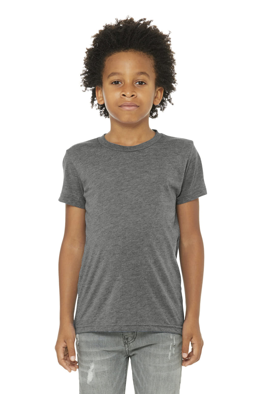 A grey youth triblend short sleeve tee displayed on a young model with curly hair, featuring a logo.