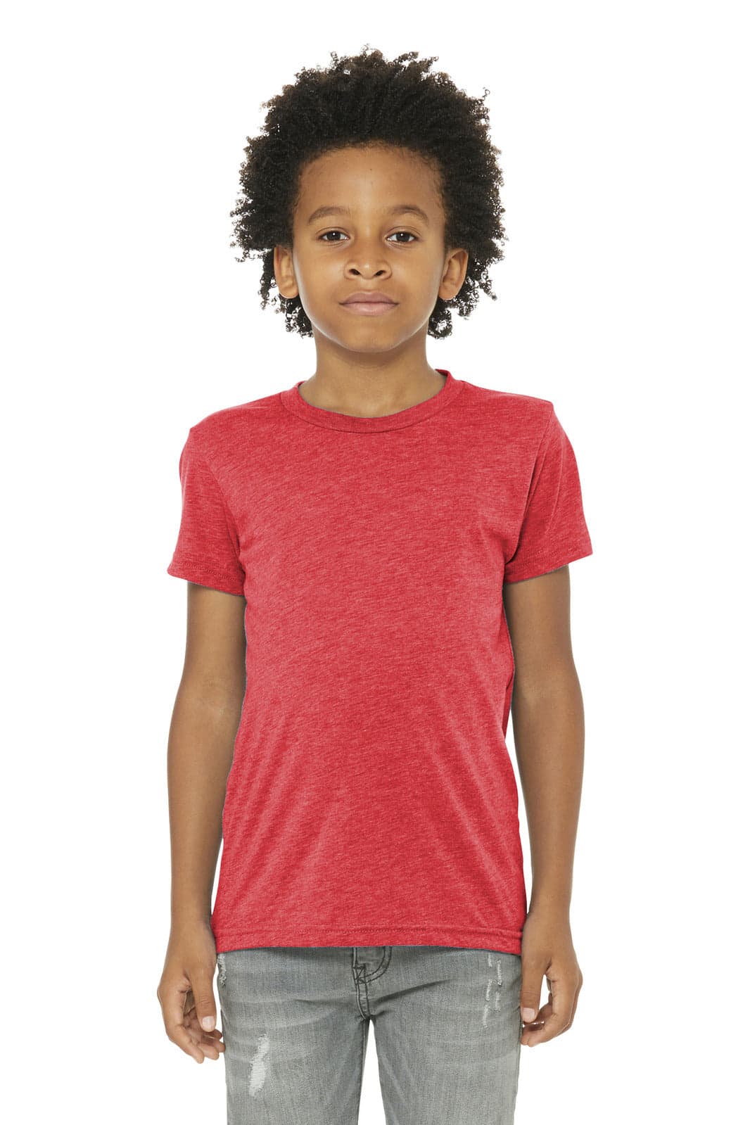 Youth triblend short sleeve tee in red, displayed on a model with curly hair, standing in a neutral pose.