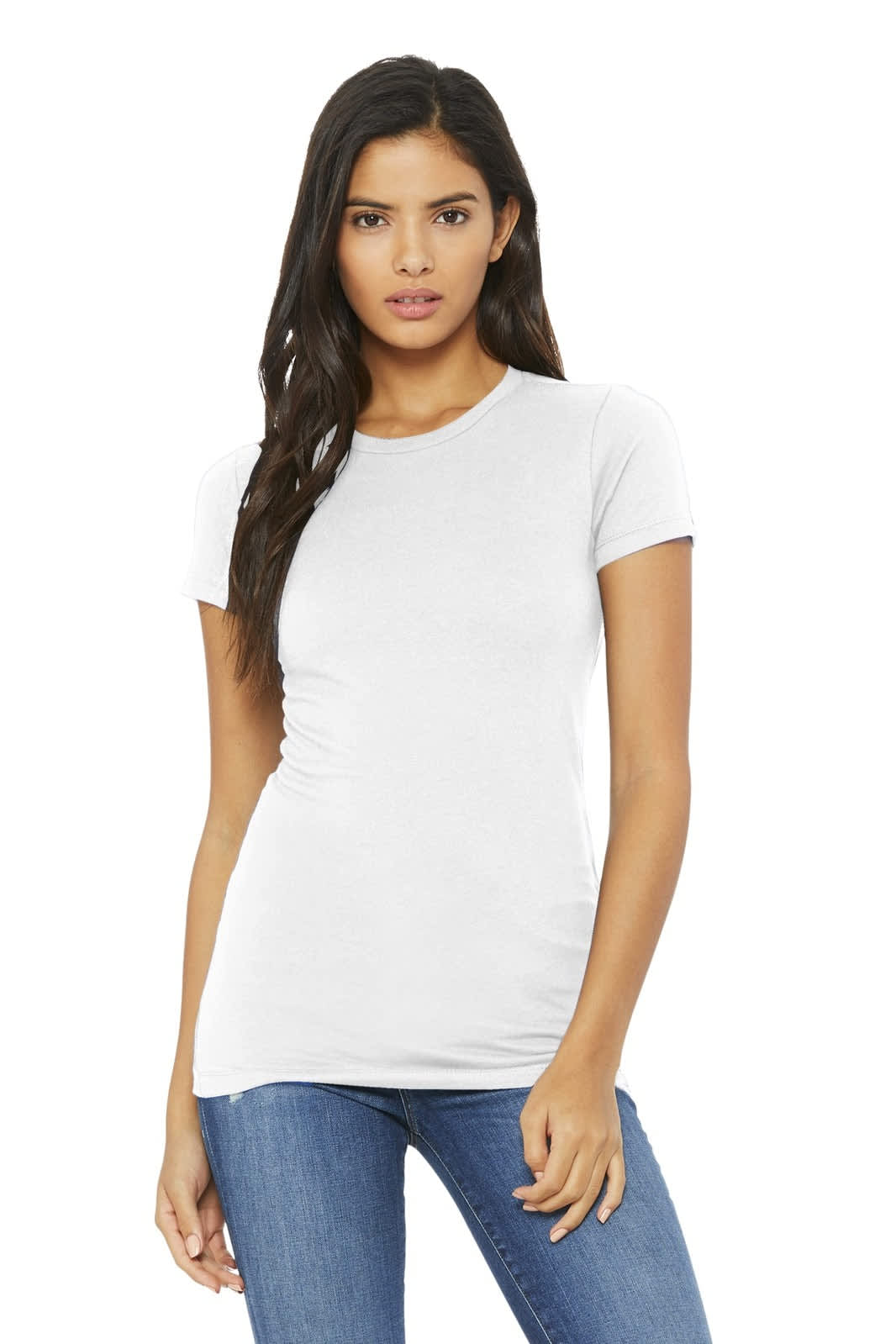 A woman wearing a fitted white t-shirt, paired with blue jeans, standing against a plain background.