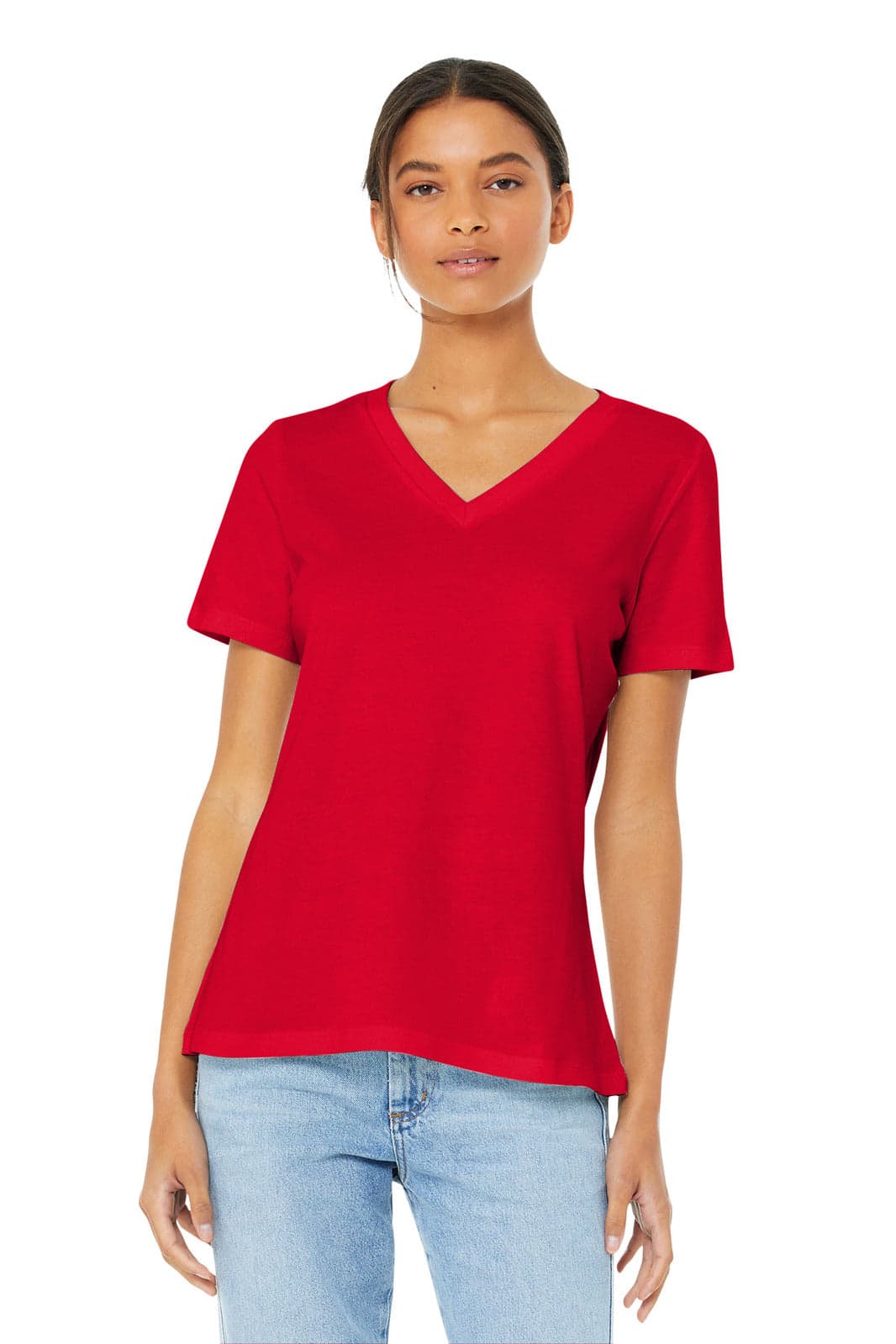 A red women's relaxed jersey short sleeve V-neck tee, featuring a logo and styled with blue jeans.