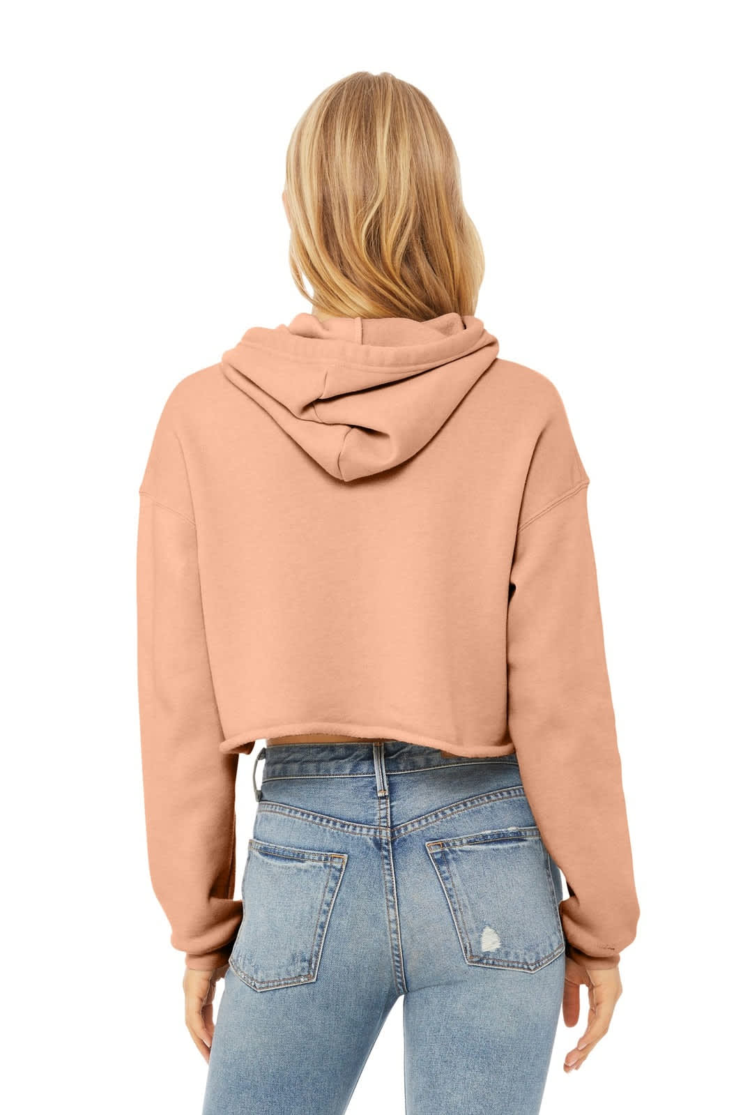 A cropped fleece hoodie in a soft peach colour, featuring a hood and long sleeves, with a logo present.
