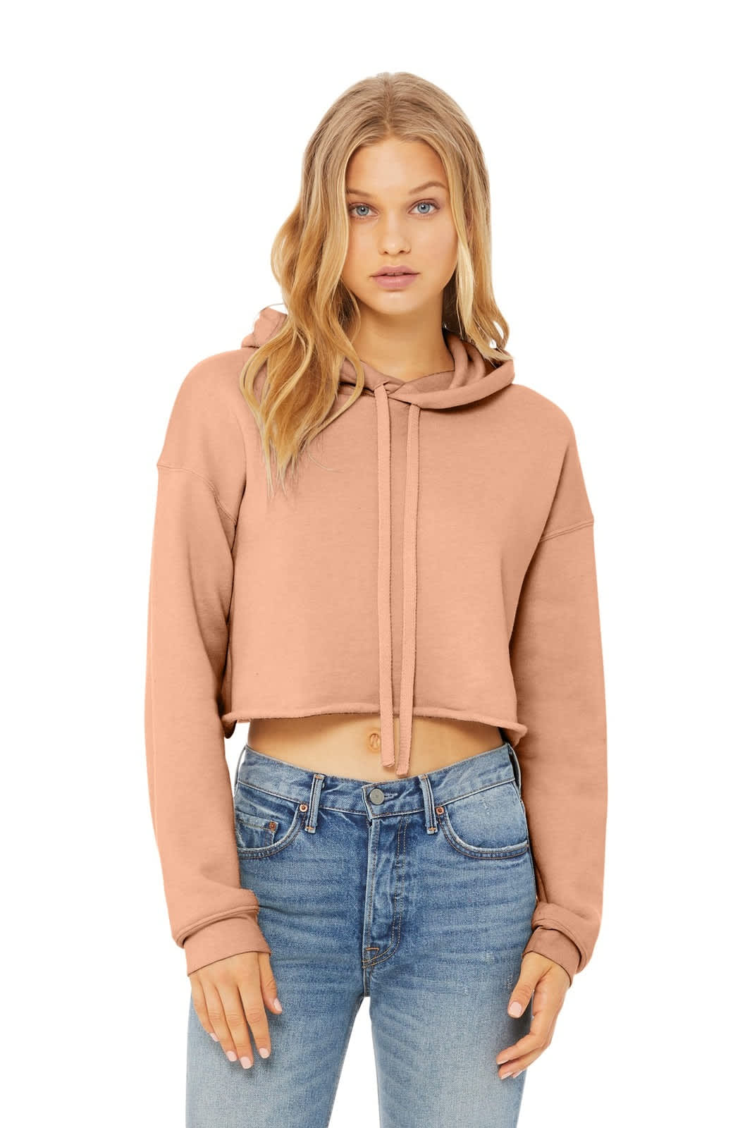 A cropped fleece hoodie in a soft beige colour, featuring a drawstring and long sleeves.