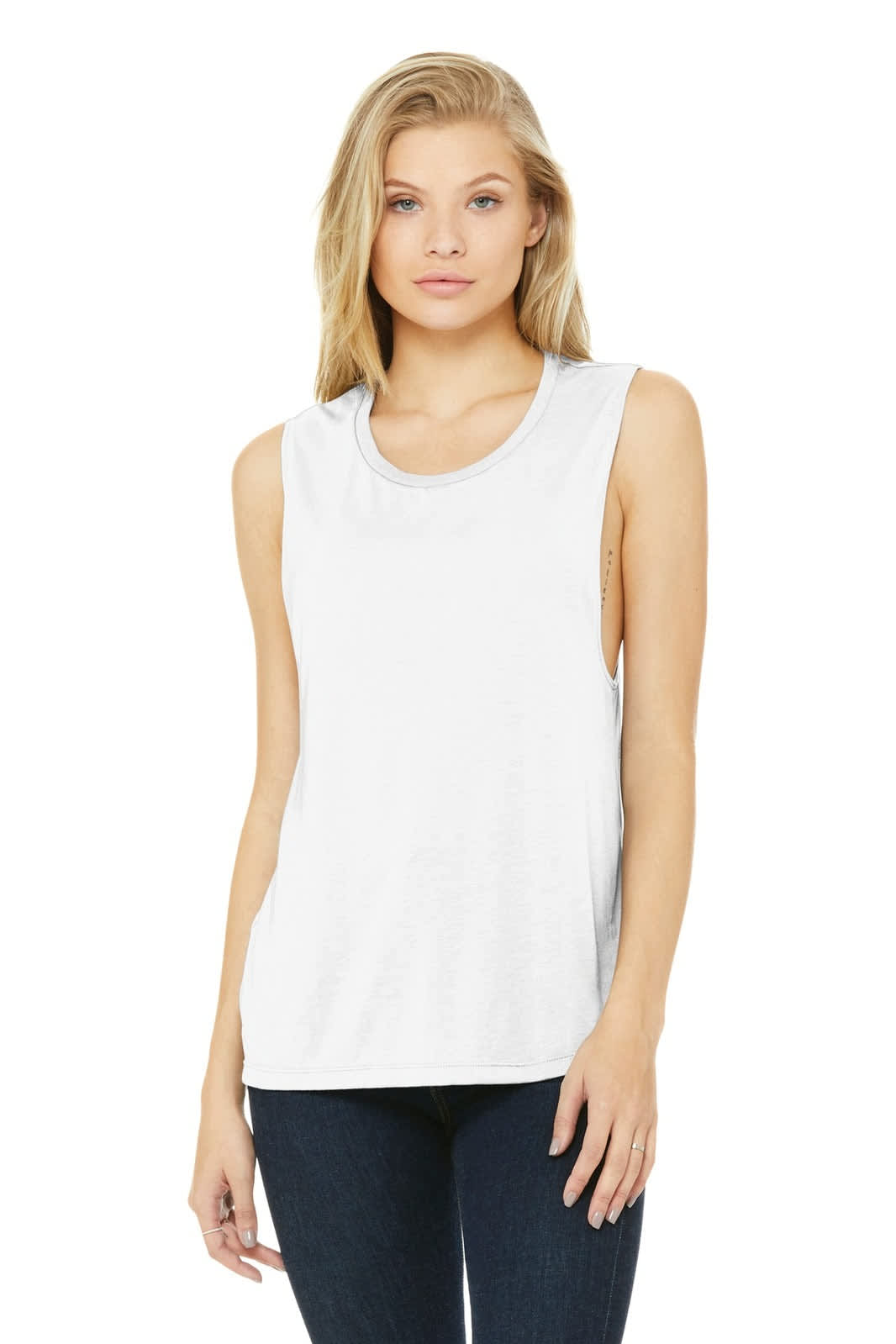 A white women's flowy scoop muscle tank top, featured on a model, with a relaxed fit and shoulder-baring design.