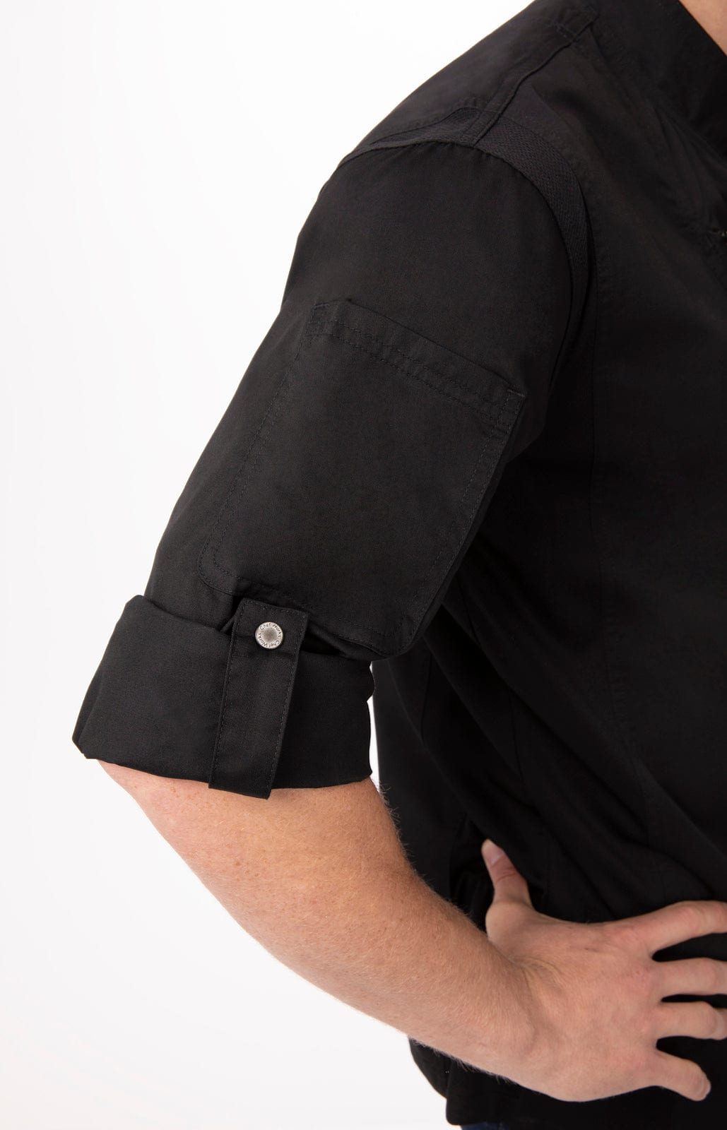 A black men's chef jacket featuring rolled sleeves and a button detail on the cuff. It includes a logo.