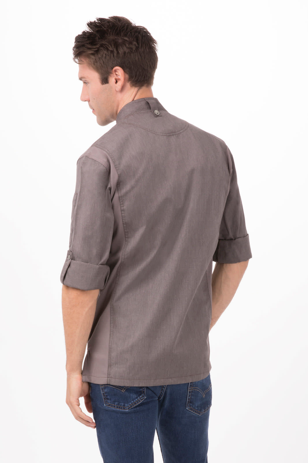 A grey men's chef jacket with rolled-up sleeves, featuring a collar and a logo. The model is turned away from the camera.