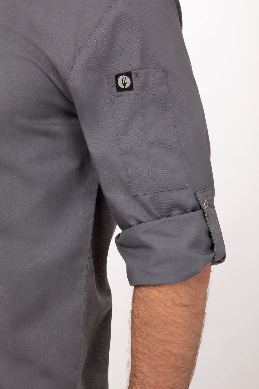 A grey men's chef jacket featuring rolled sleeves and a logo on the arm.