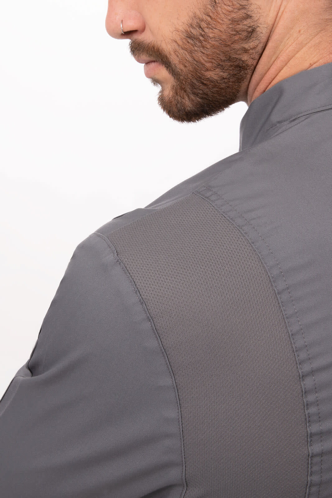 A grey men's chef jacket featuring a textured panel, showcasing a close-up view of the back and shoulder area.