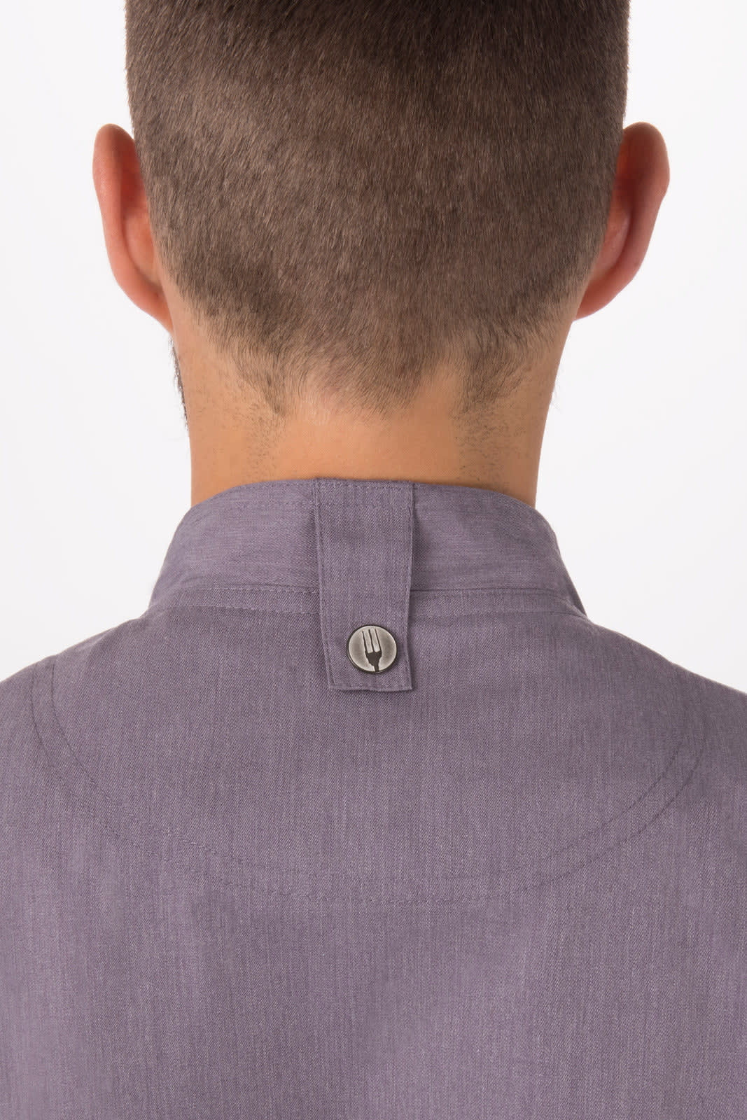 A grey chef jacket featuring a button closure at the back collar. The design is simple and professional.