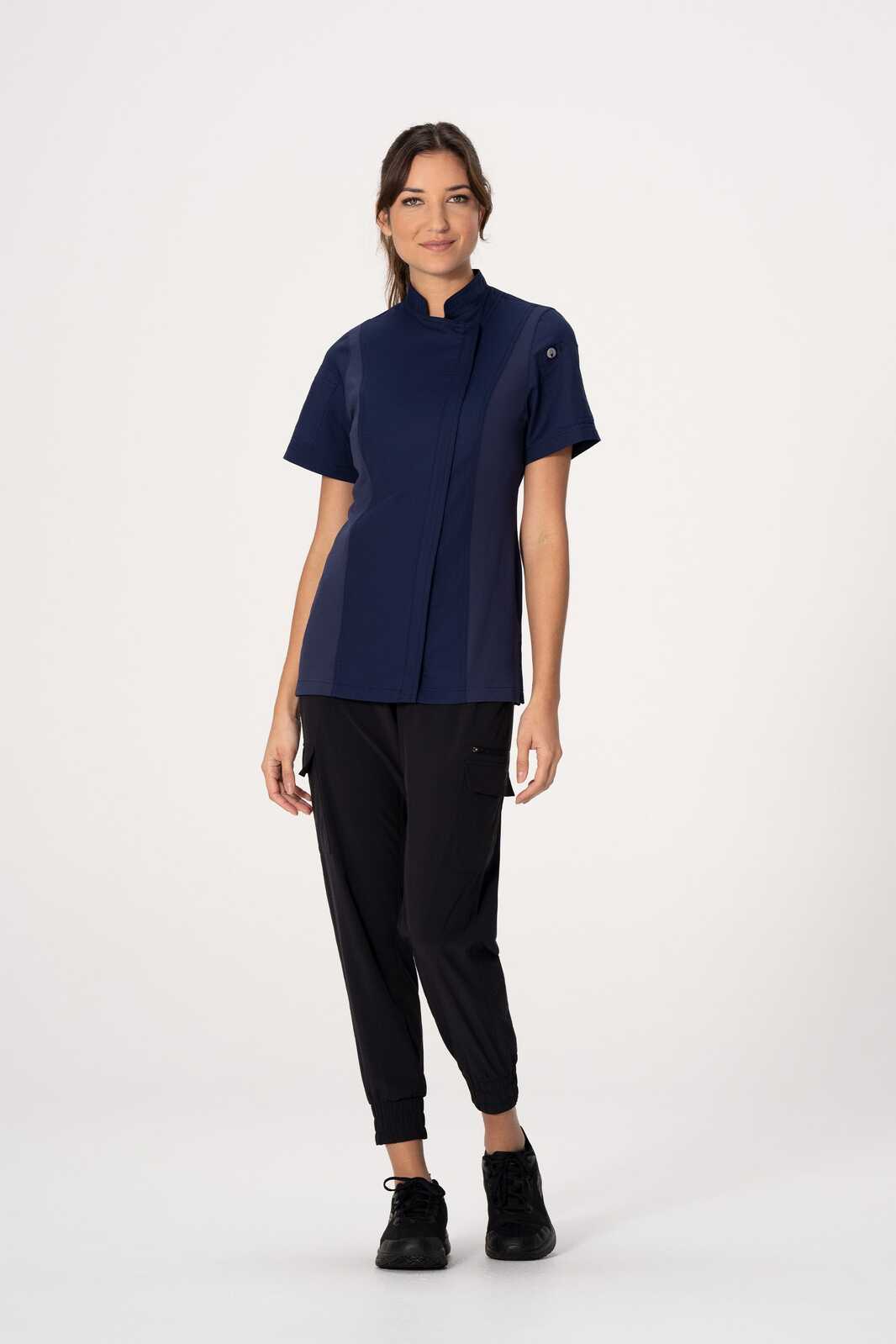 A navy chef jacket with short sleeves, featuring a collar and a logo, paired with black pants and black shoes.