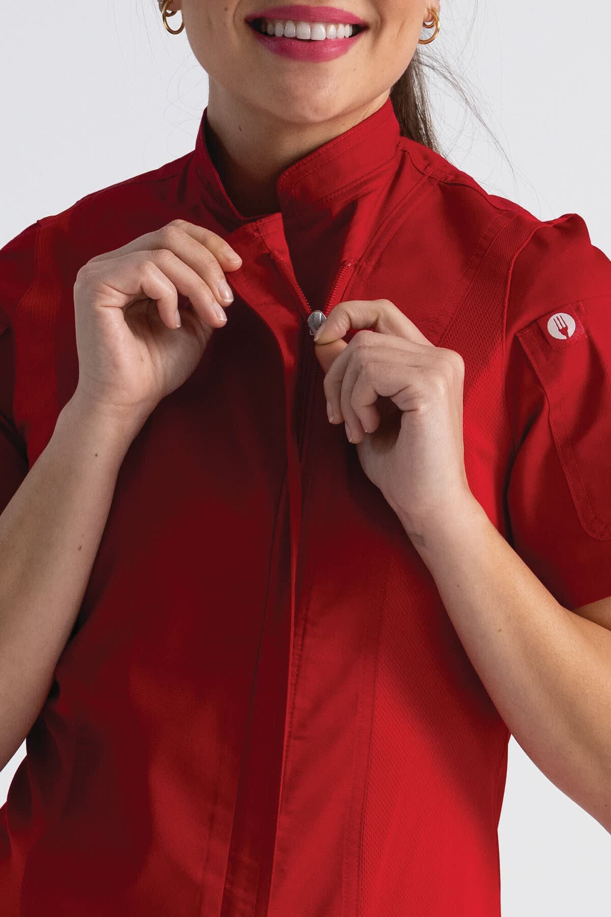 A red women's chef jacket with a stand-up collar and button fastening, featuring a logo on the sleeve.