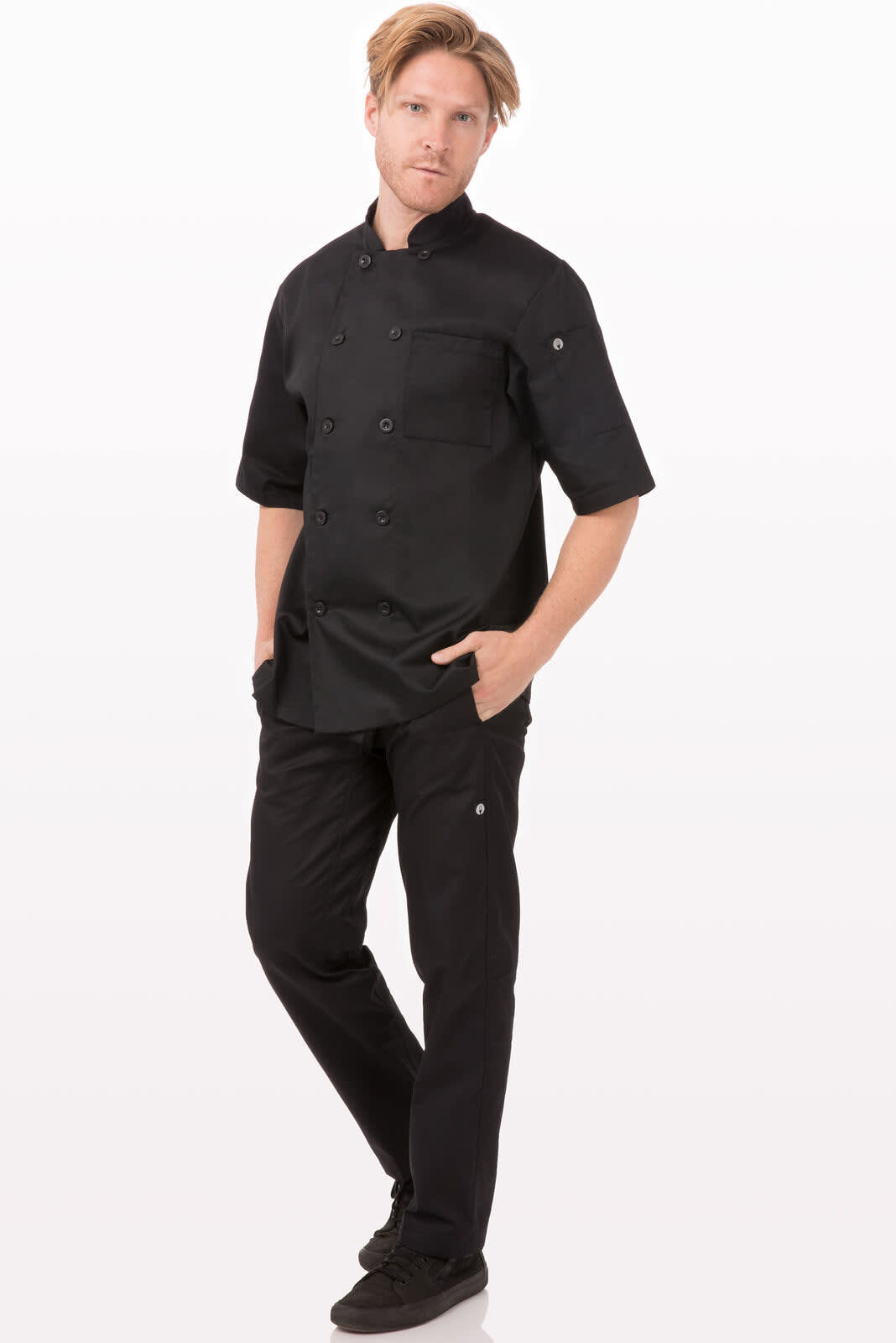 A black chef jacket with short sleeves, featuring a logo, paired with black trousers and shoes.