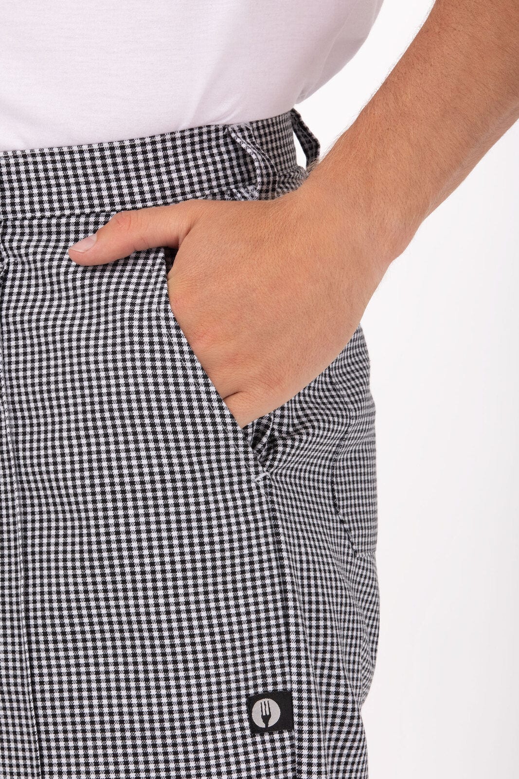 Black and white checkered men's chef pants with a side pocket, featuring a small logo.