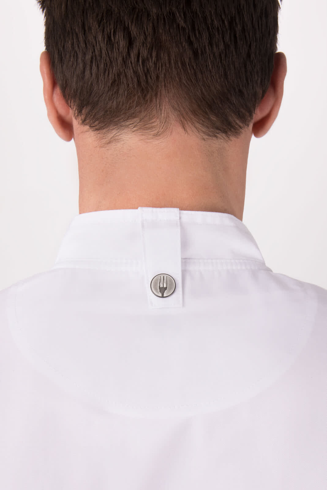 A white chef jacket featuring a metal button at the back of the neck and a smooth collar design.