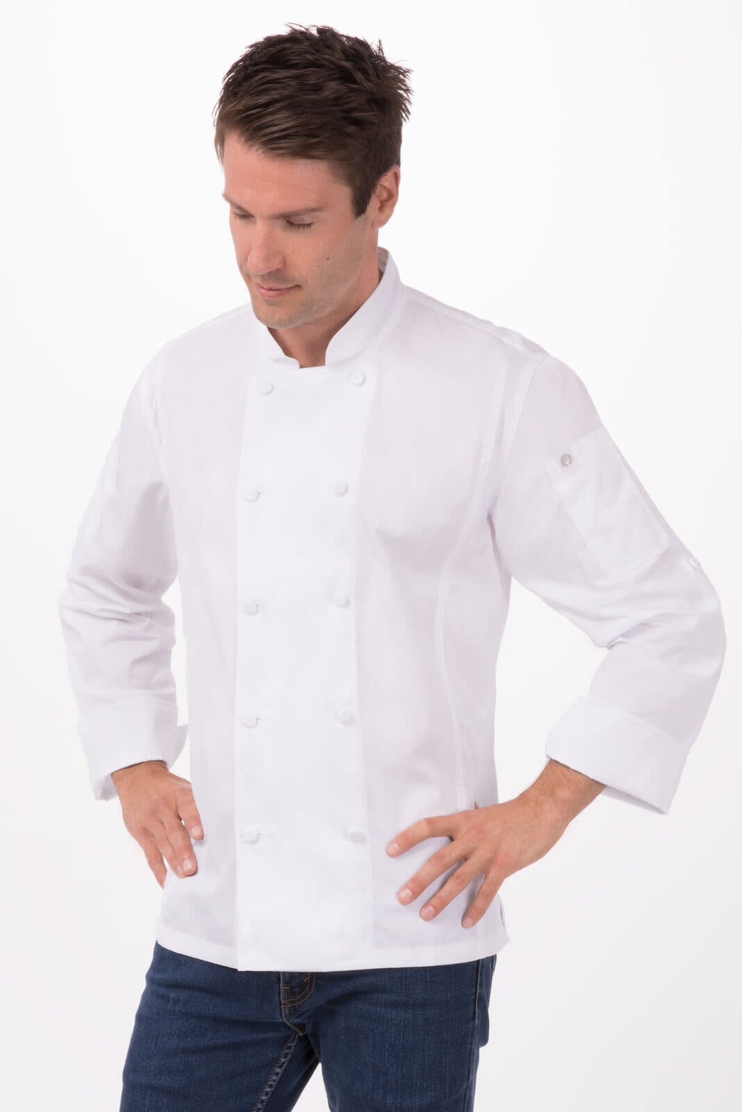 A white chef jacket worn by a man, featuring a logo and double-breasted design. The model stands with hands on hips.